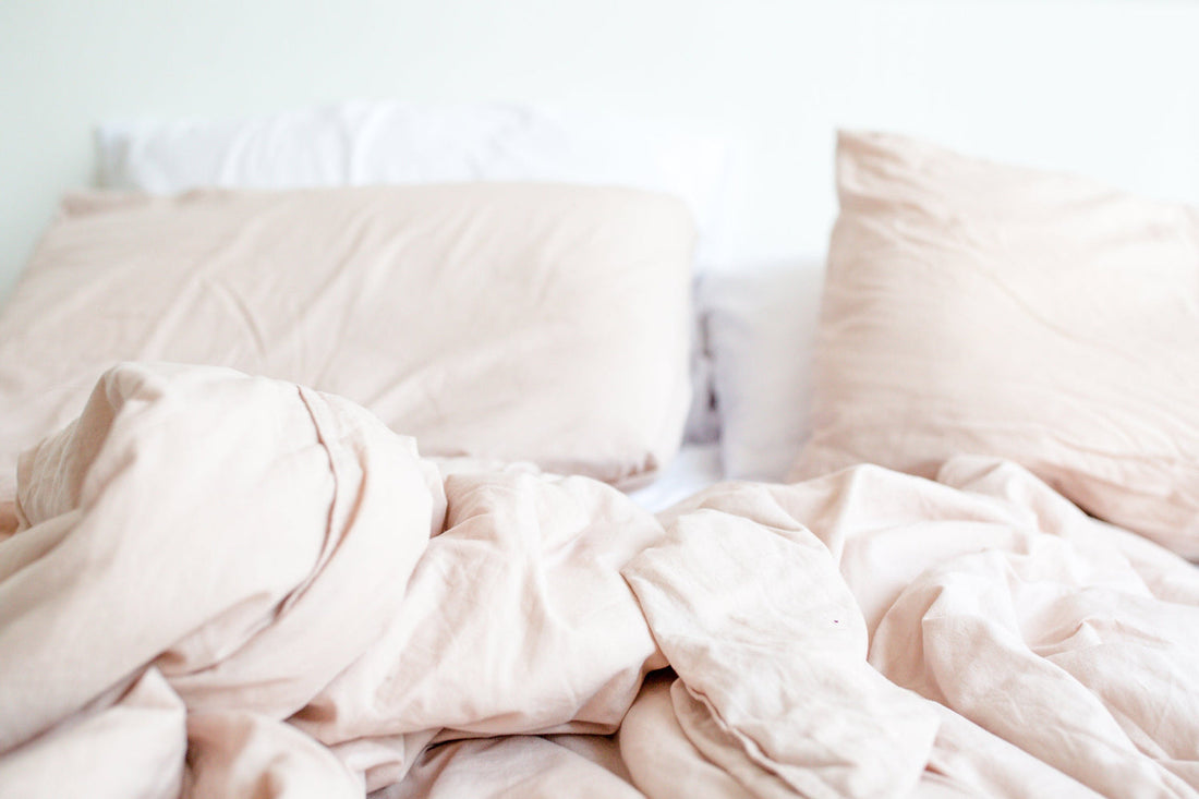 Cozy bed scene for sleep and wind-down teas
